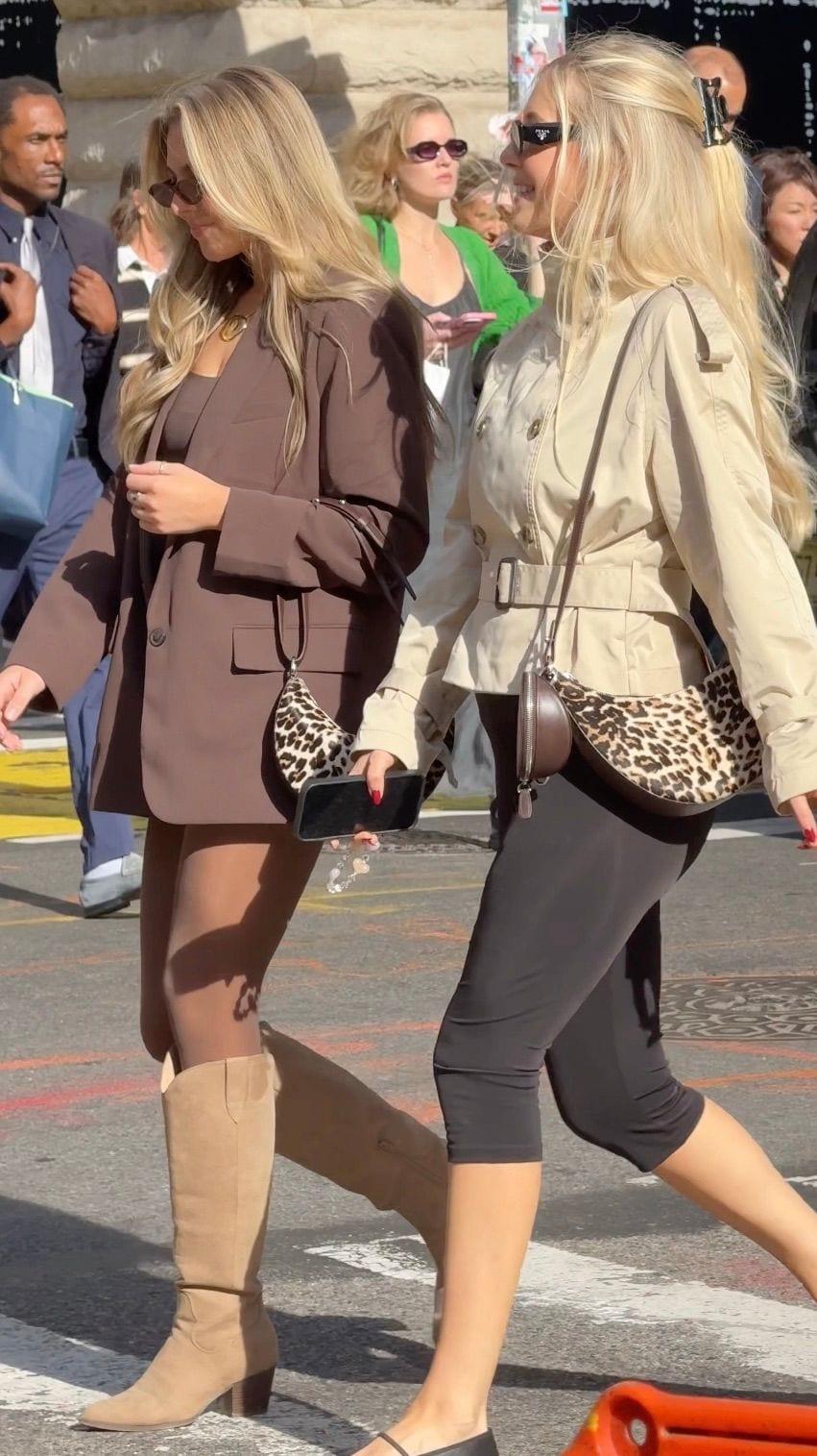 Brown blazer with tan boots and leopard purse; beige belted jacket with leopard bag.