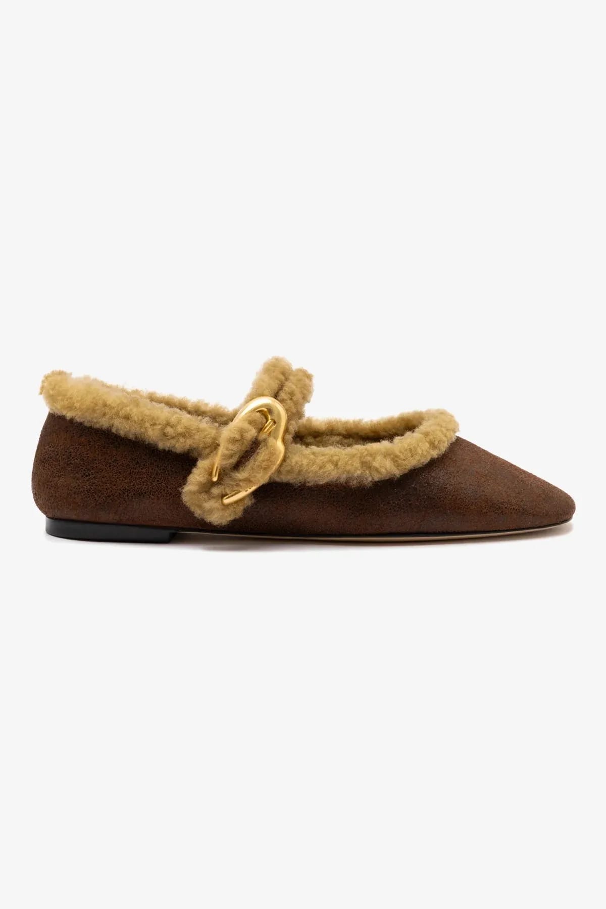 Brown suede flat shoes with light brown sheepskin lining and gold heart buckle.