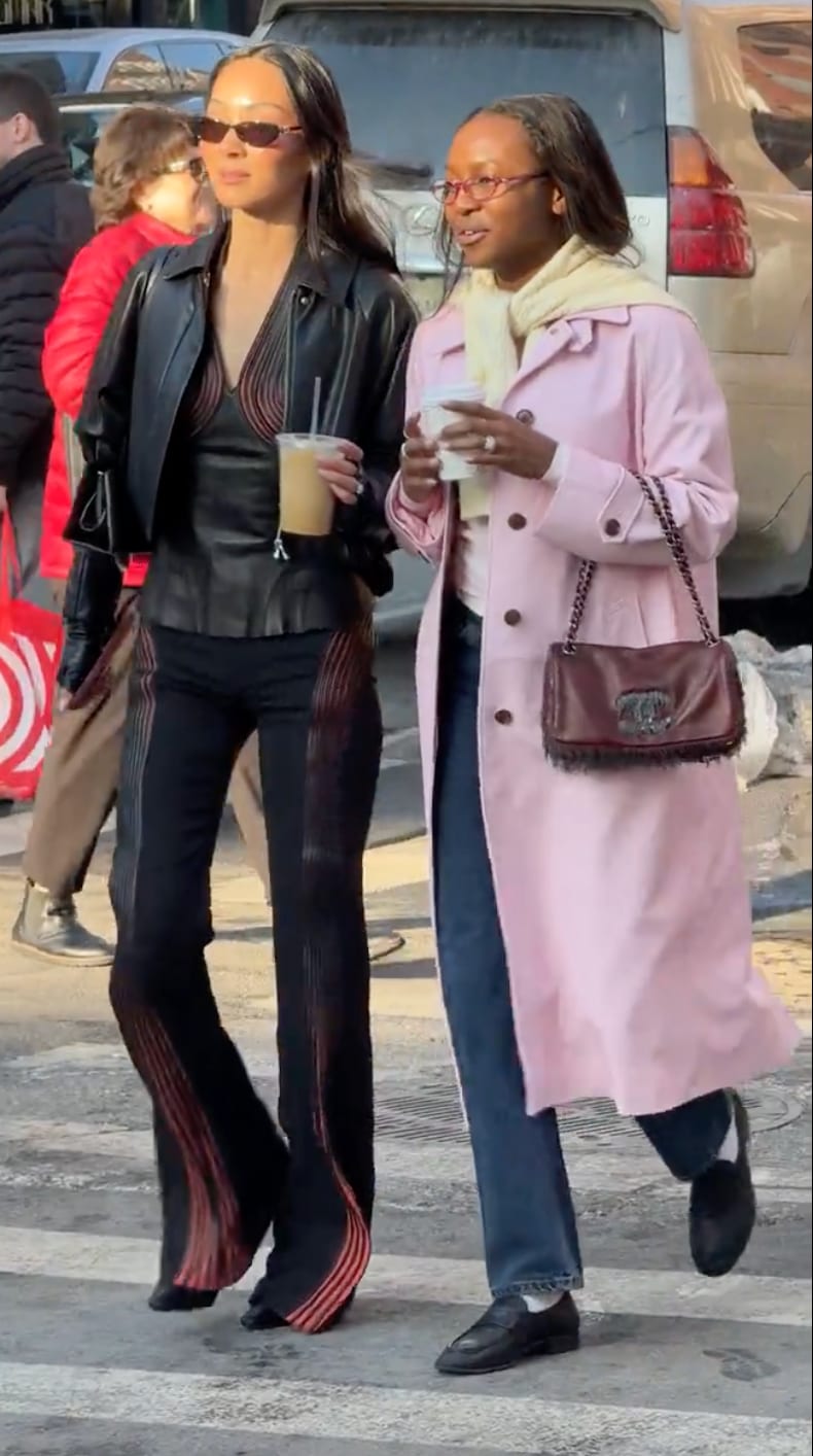 Black leather jacket and striped pants, pink trench coat, jeans, and loafers.