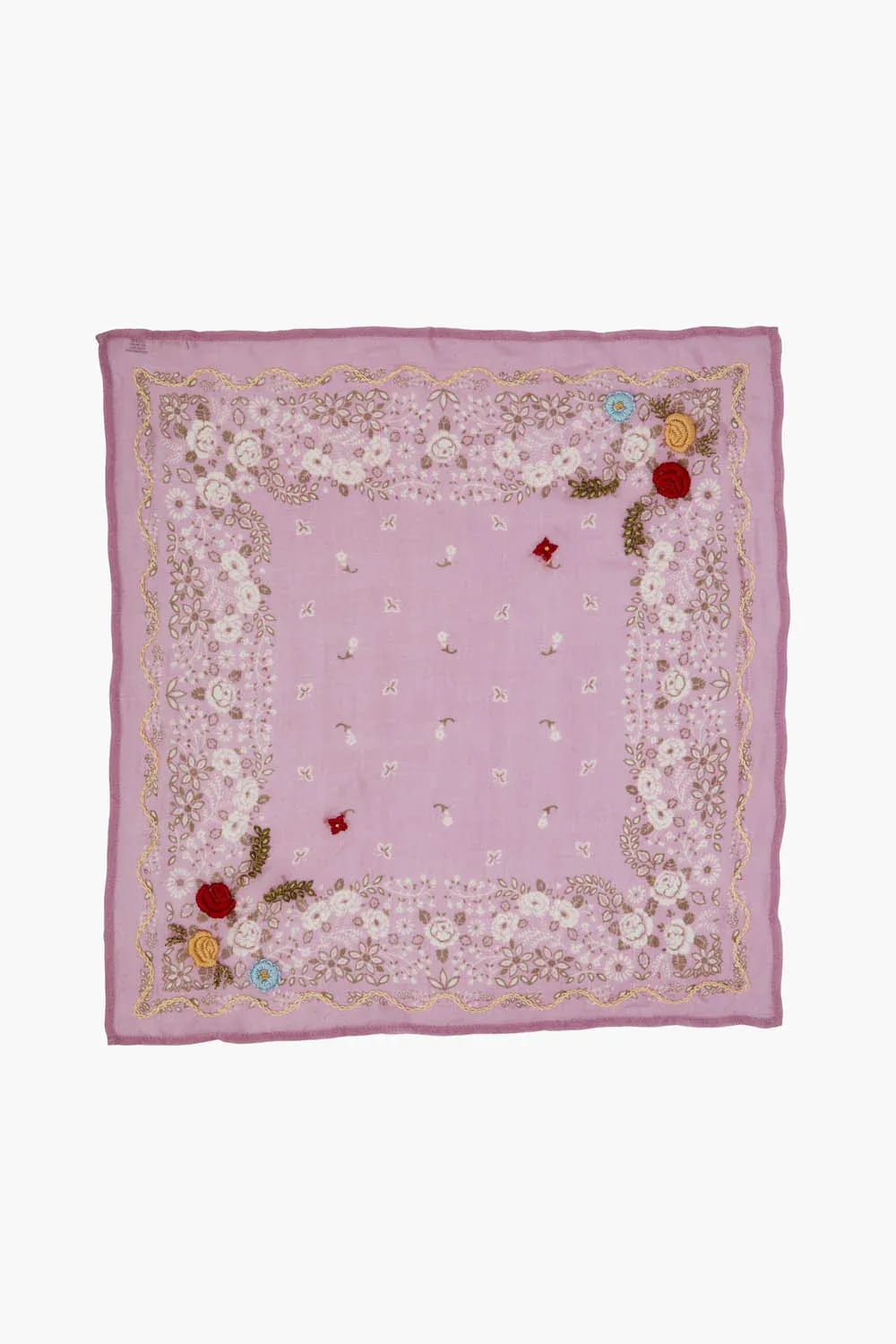 Lilac bandana with intricate white floral embroidery and colorful crochet flowers.
