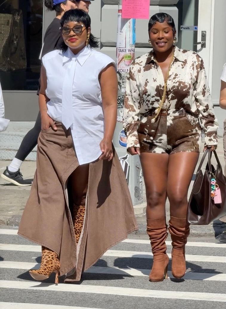 White sleeveless shirt with brown wrap skirt and leopard print boots; cow print shirt and shorts with brown boots.