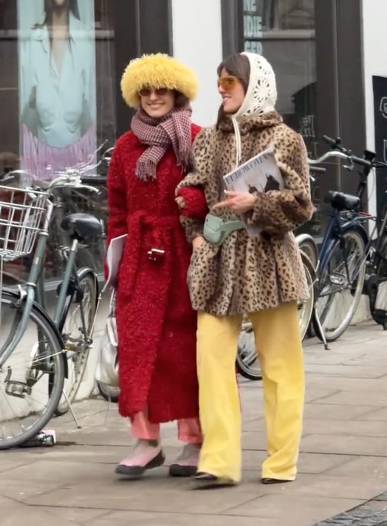 Red textured coat with yellow fluffy hat & leopard print jacket with yellow pants.